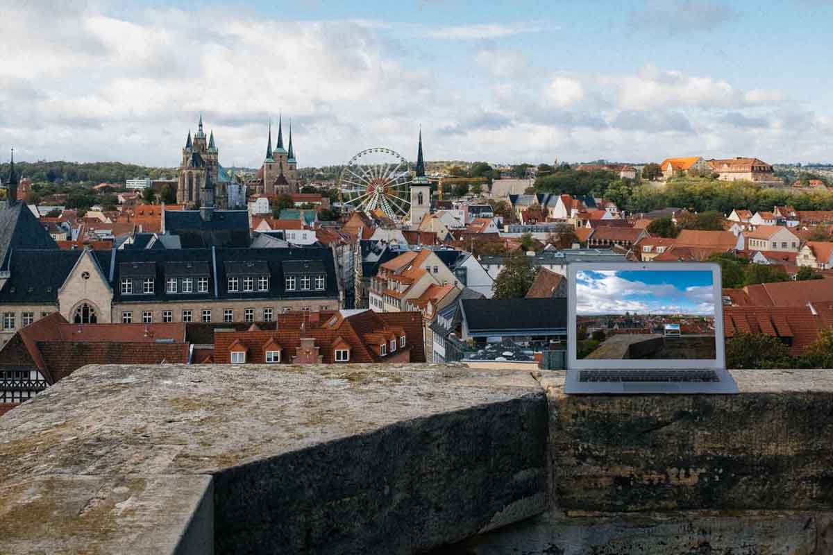 Laptop on a wall in a city in Germany